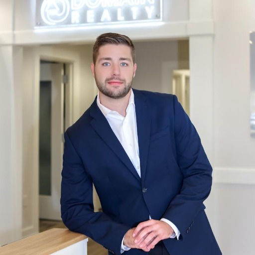 Jake Comisar, Domain Realty Group